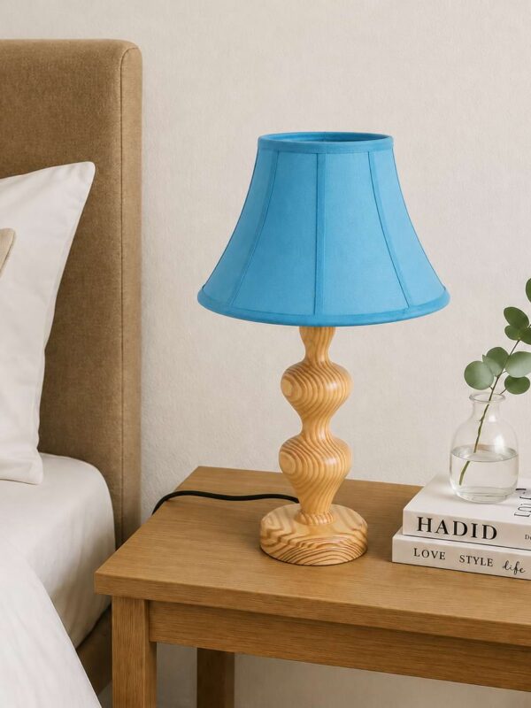 Handcrafted wooden table lamp with blue fabric shade