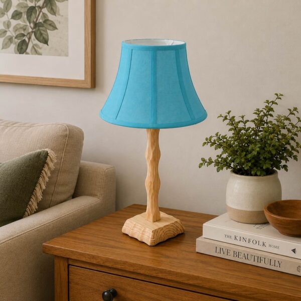 Handcrafted wooden table lamp with blue fabric shade