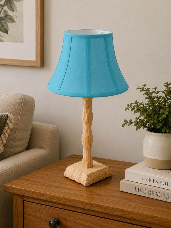Handcrafted wooden table lamp with blue fabric shade